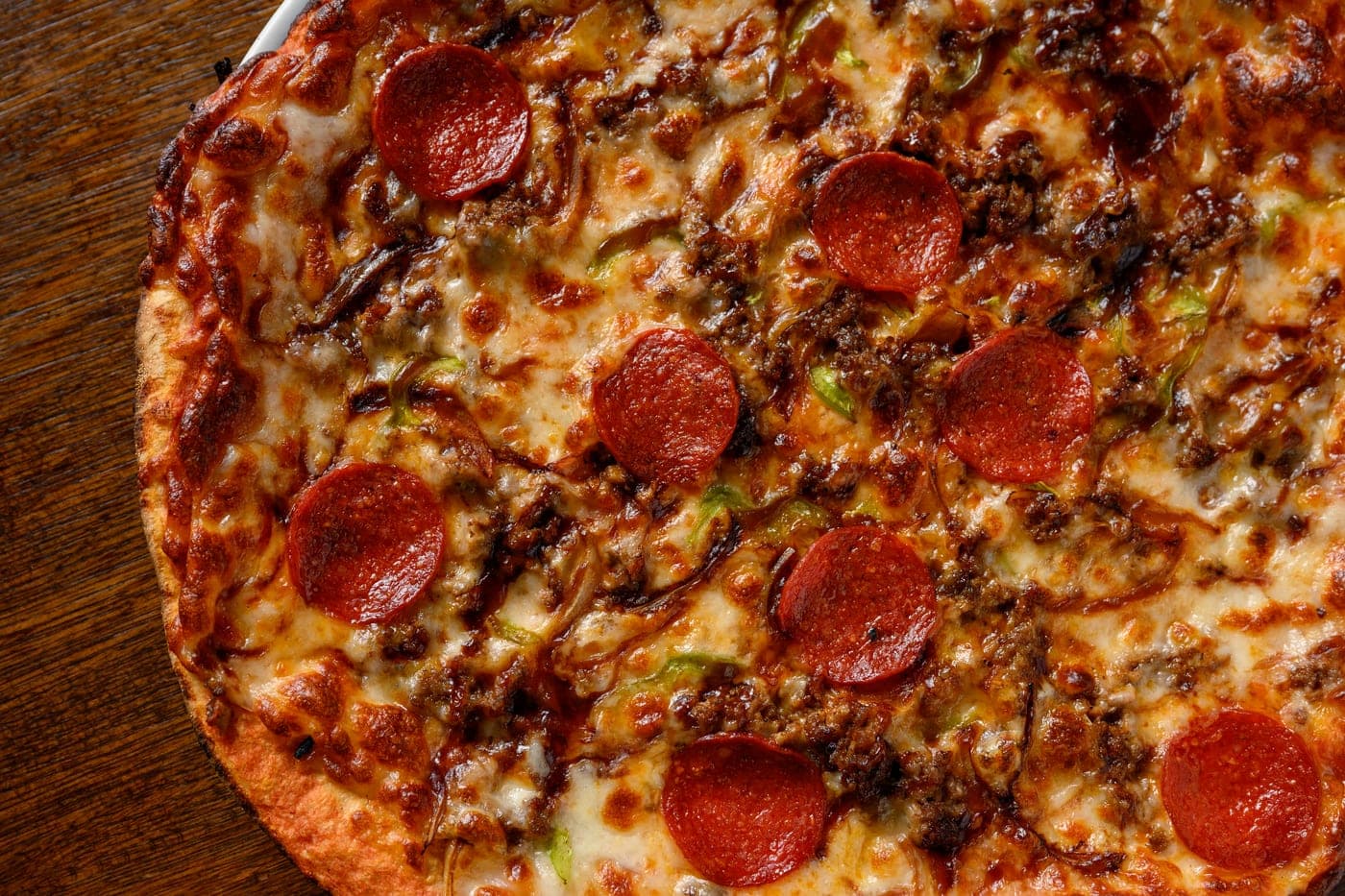 A pepperoni pizza fresh out of the oven